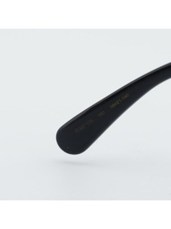 Gucci GG0712S 002 Women Sunglasses Black Round Frame, Blue Lenses